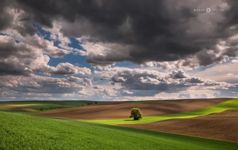 Dramatic sky and Moravian Tuscany landscape in spring by Radek Severa moravske toskansko