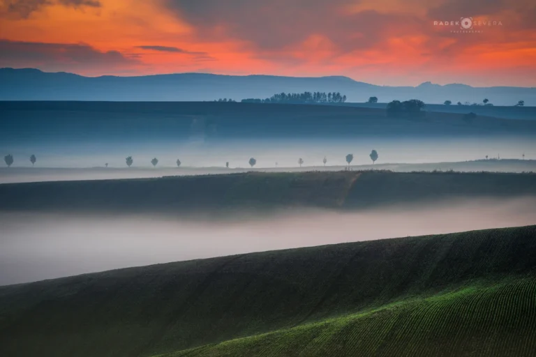 Rolling hills misty morning at sunrise in Moravian Tuscany by Radek Severa moravske toskansko mlha