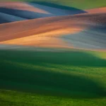 Rolling hills wavy landscape in spring March in Moravian Tuscany by Radek Severa
