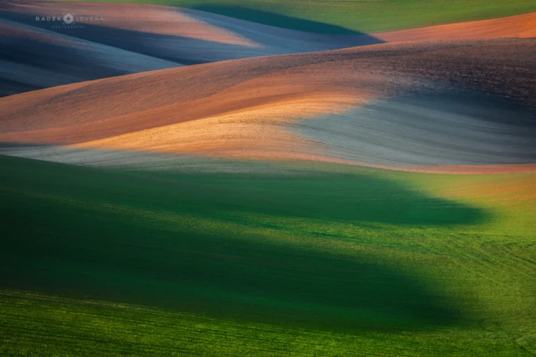 Rolling hills wavy landscape in spring March in Moravian Tuscany by Radek Severa